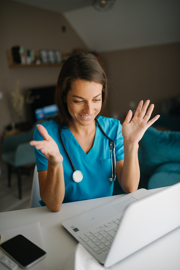 A clinician on a video consultation
